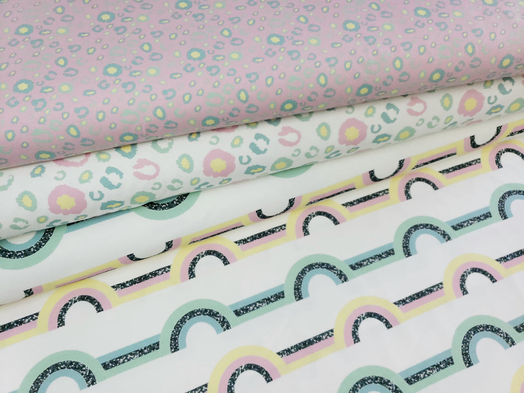 Glittery Rainbows Pastel Organic Jersey by Wcollection